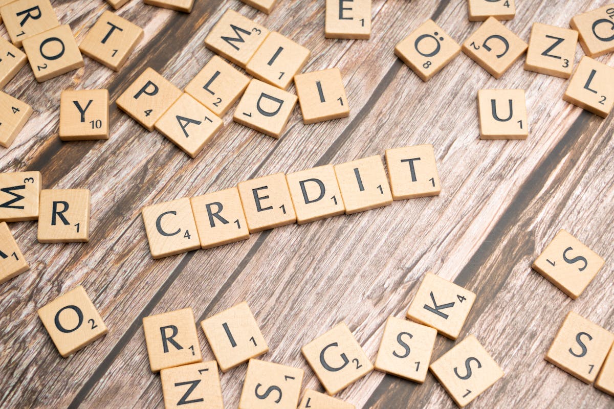 Credit score and credit report on a desk representing rate shopping impact during a refinance